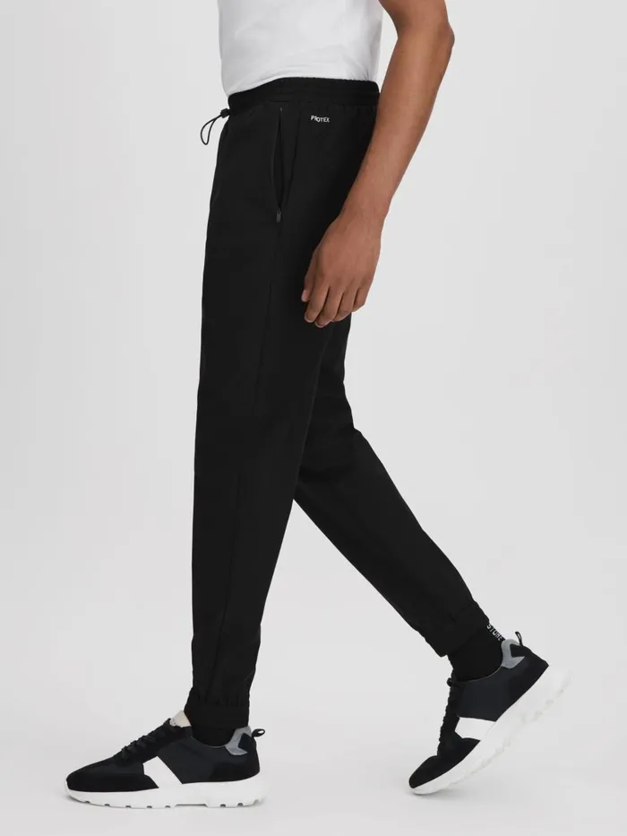 Men Reiss Sweats Hoodies and Joggers Dax Castore Water Repellent Track Pants Onyx Black